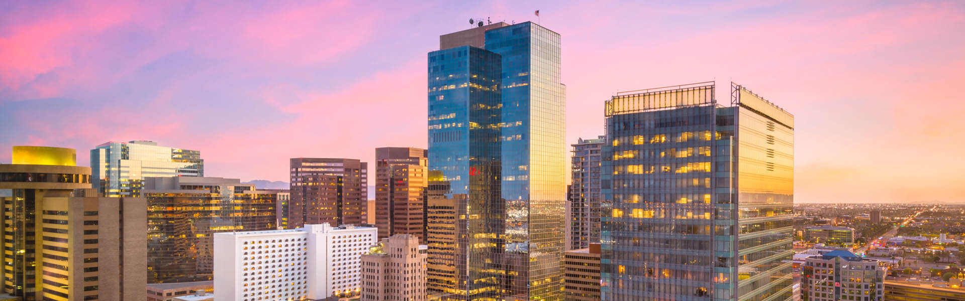 Neon color image of a band playing and people singing along