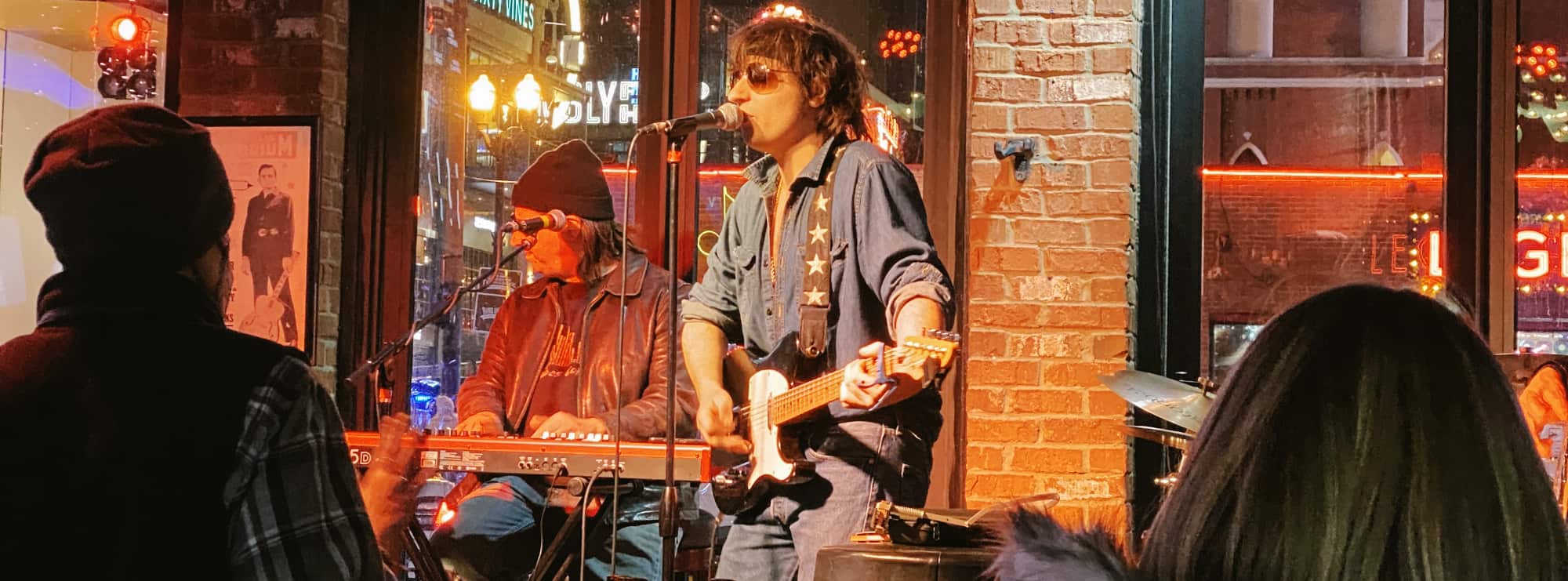 bar singer on guitar in Phoenix